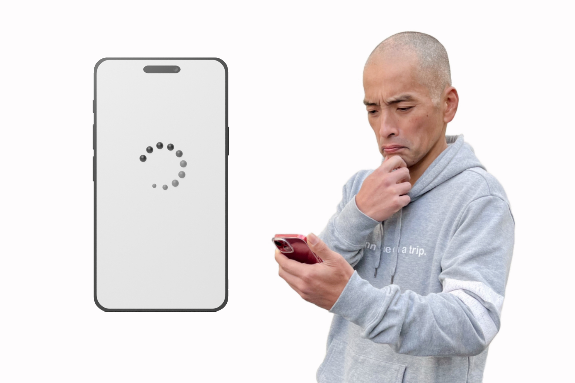 スマホの処理中画面で顔をしかめる中年男性