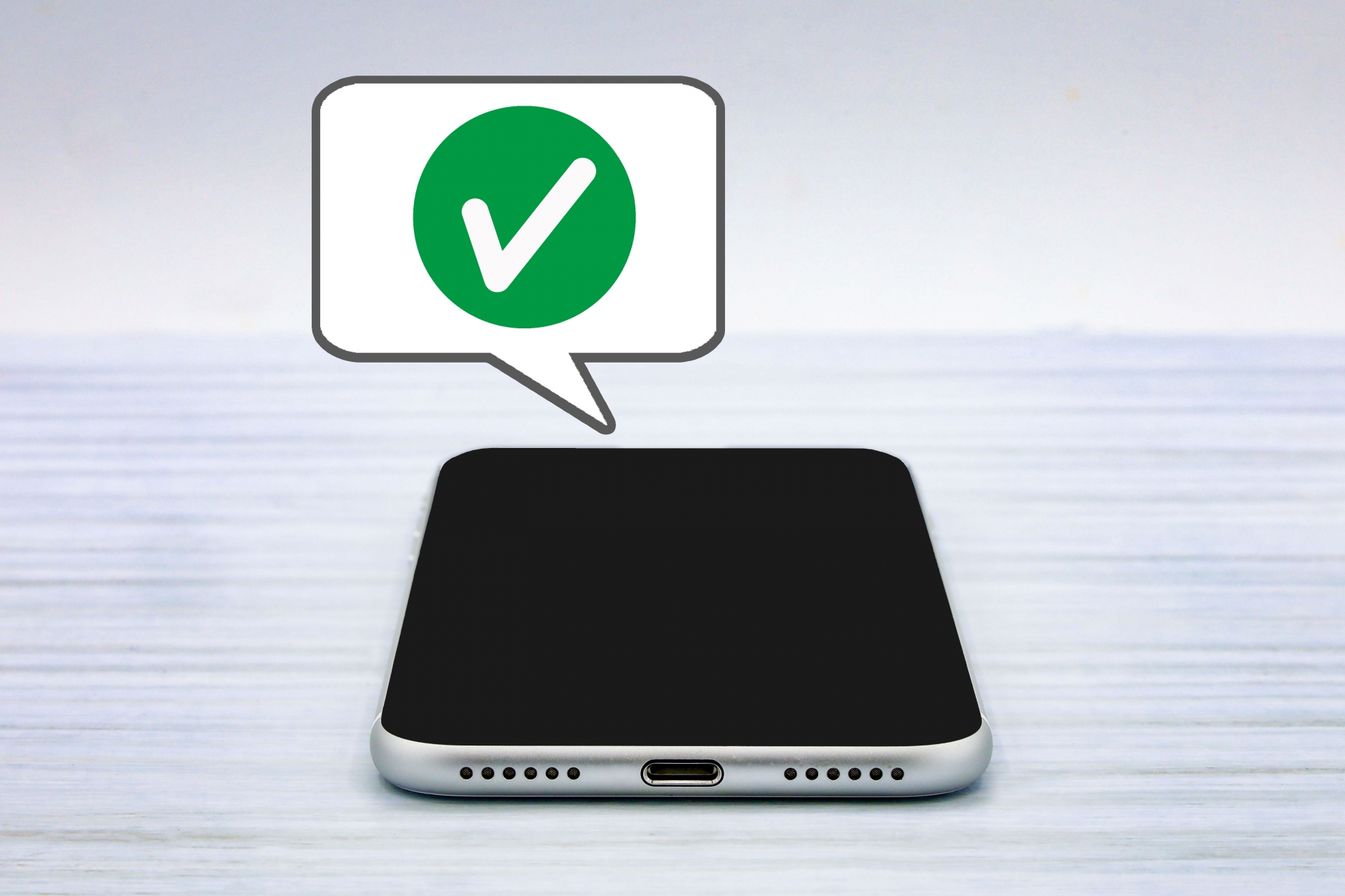 スマホとチェックマーク