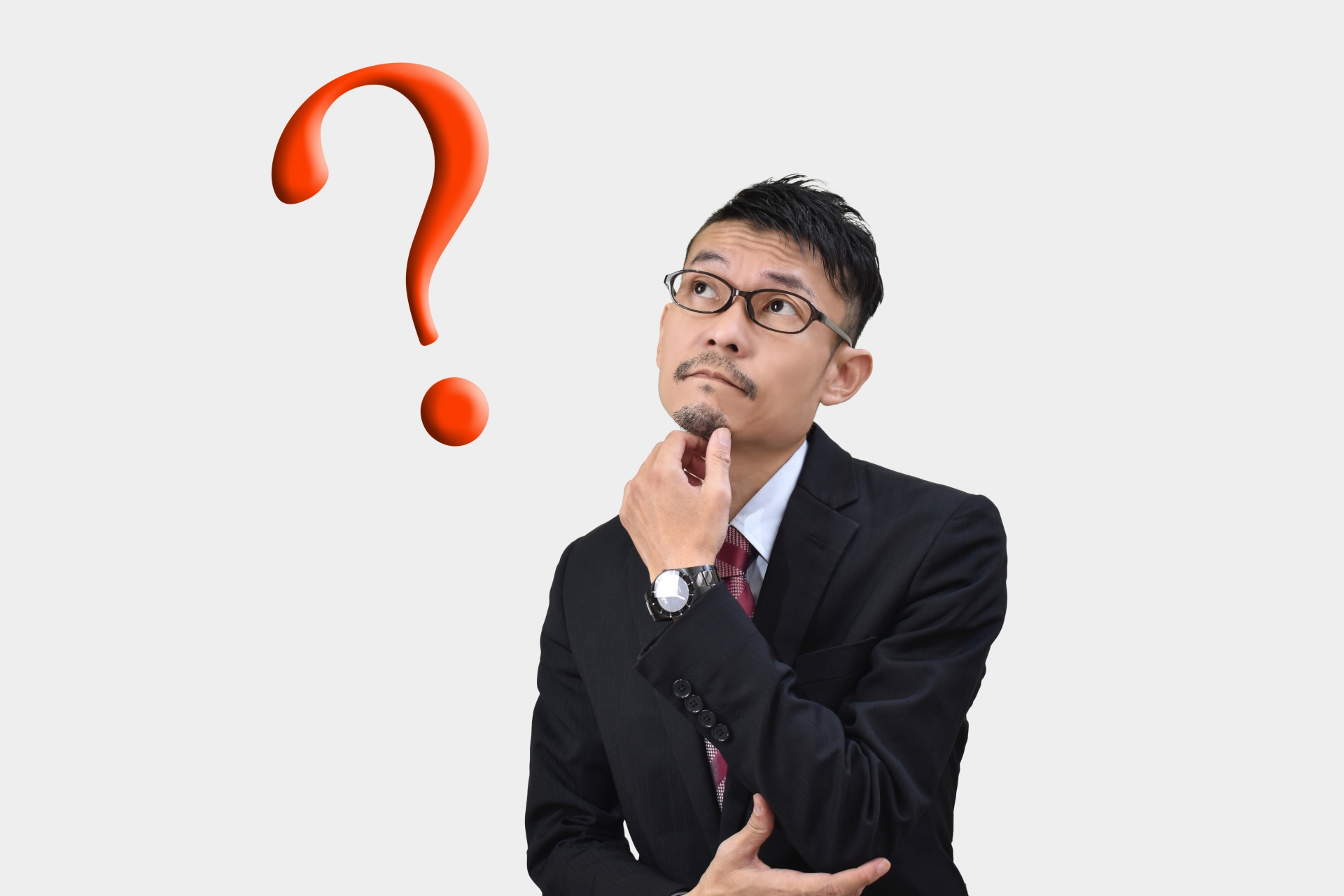 クエスチョンマークとビジネスマン