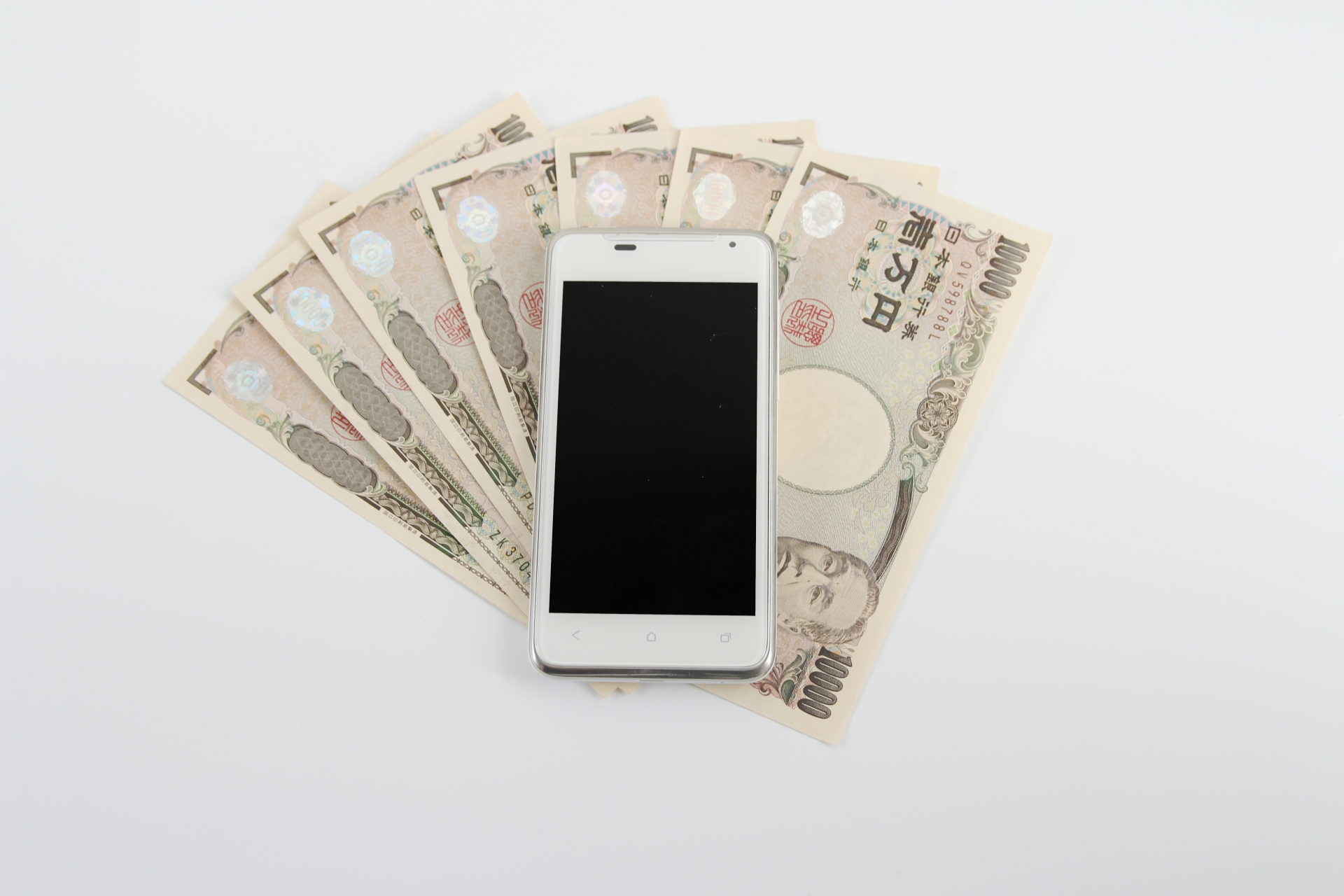 スマホと千円札のイメージ