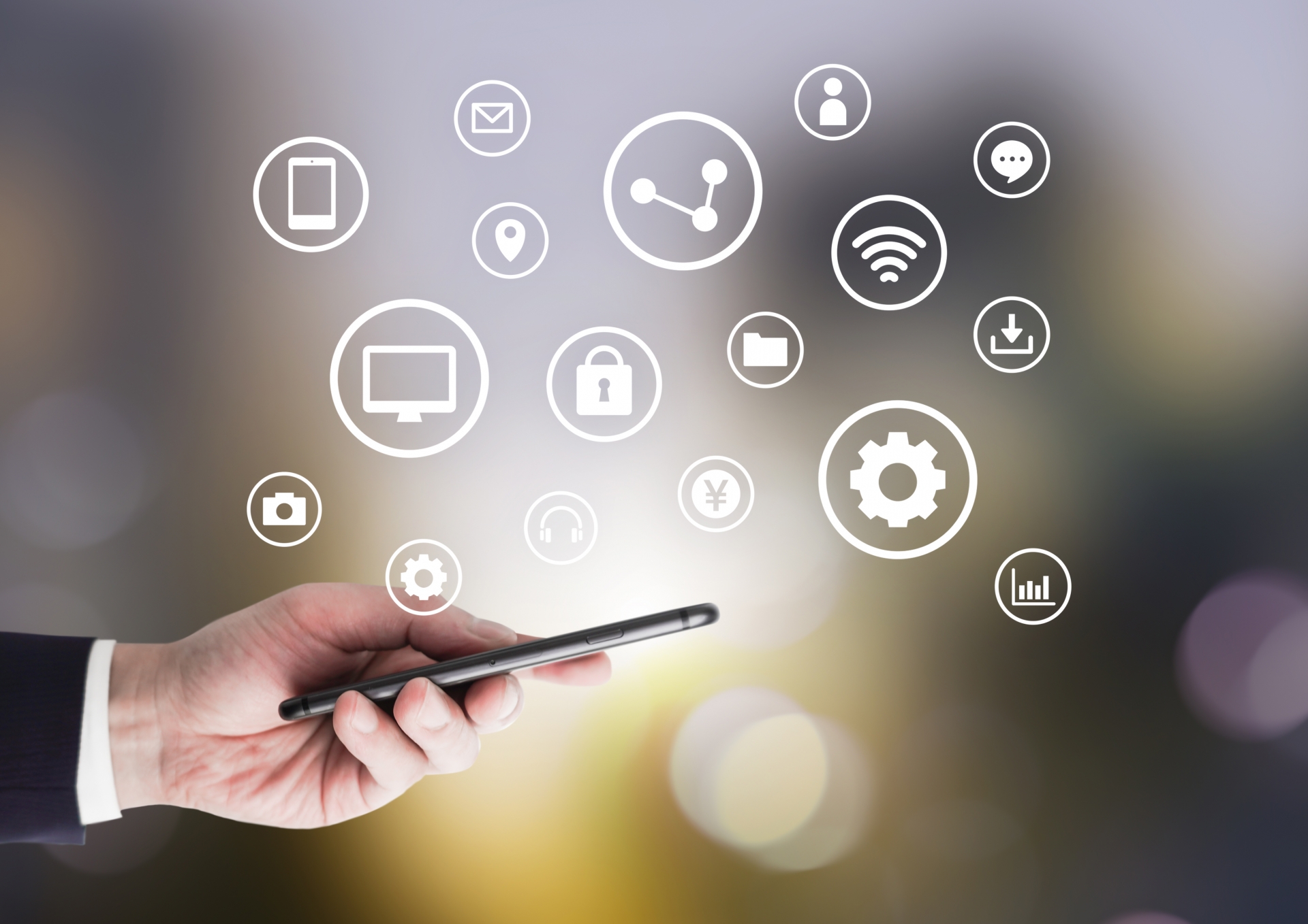 ビジネスマンのスマホとアイコン