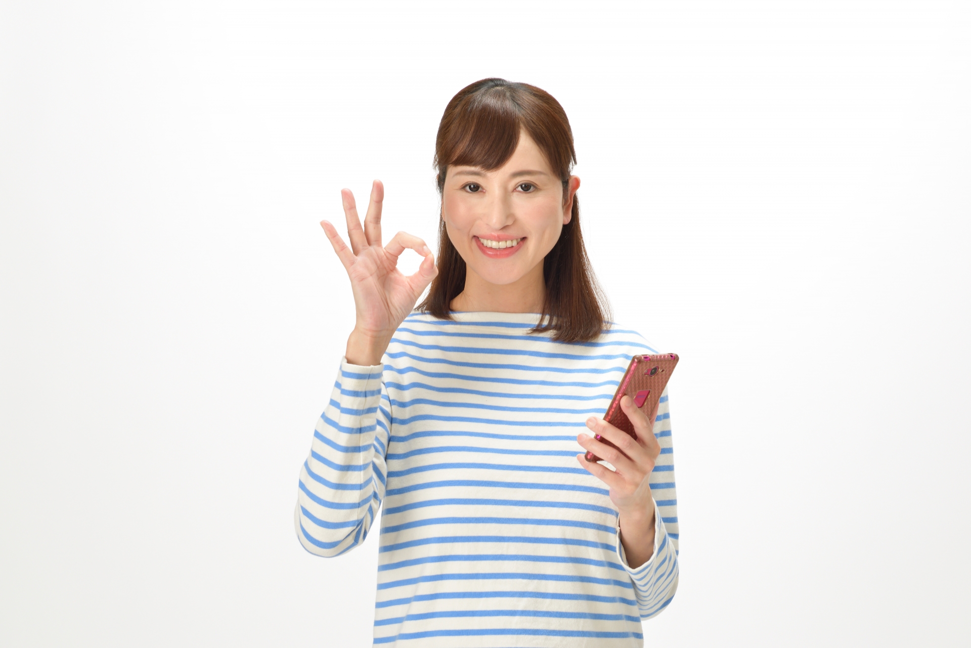 OKサインをする主婦1