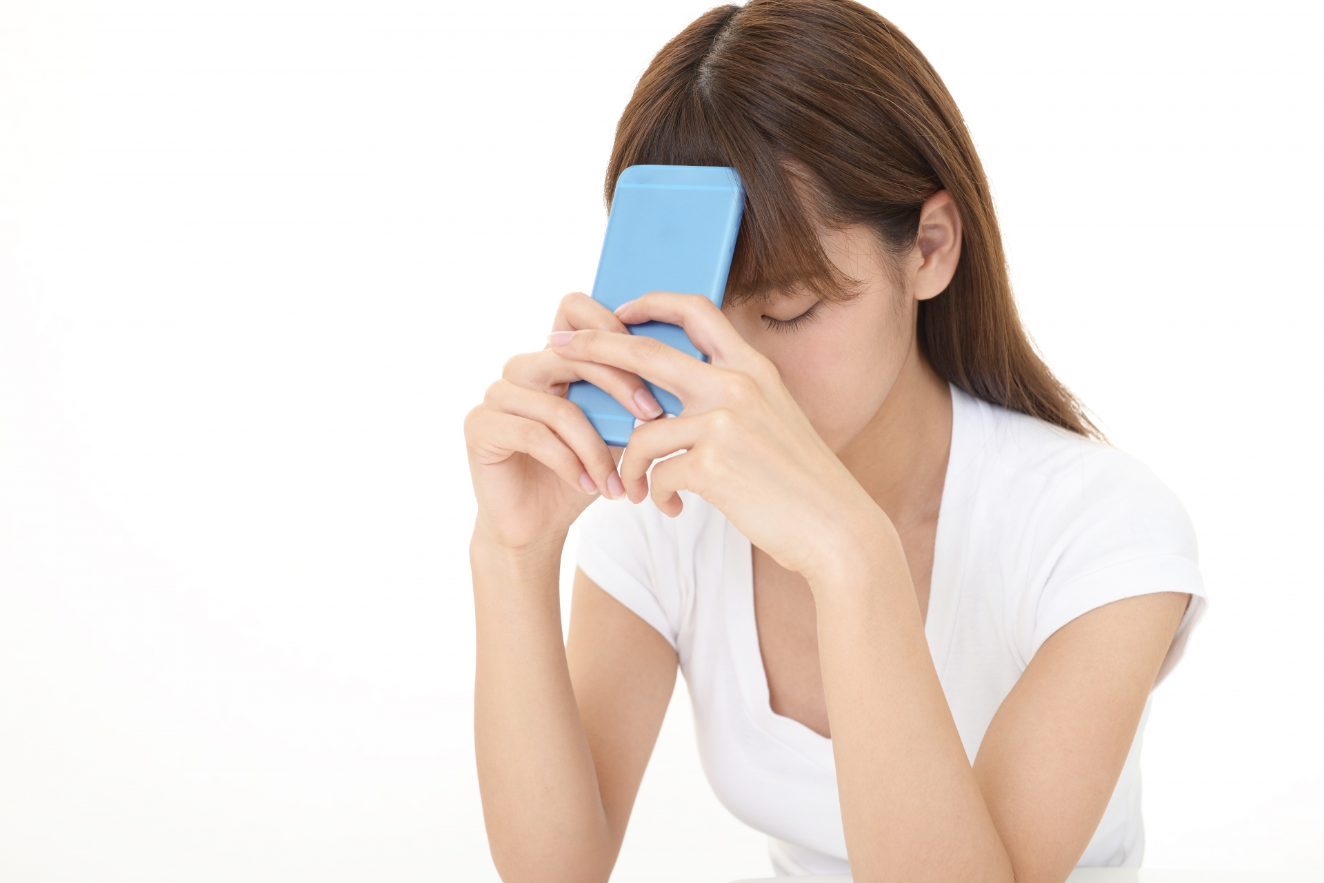 スマートフォン 女性 落ち込む