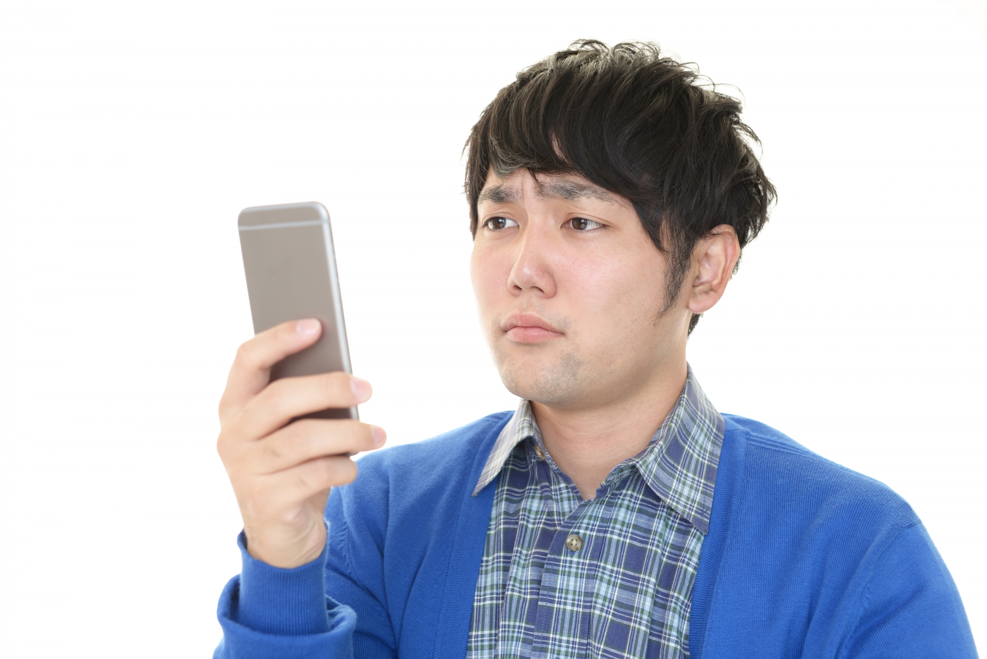 困った顔の男性